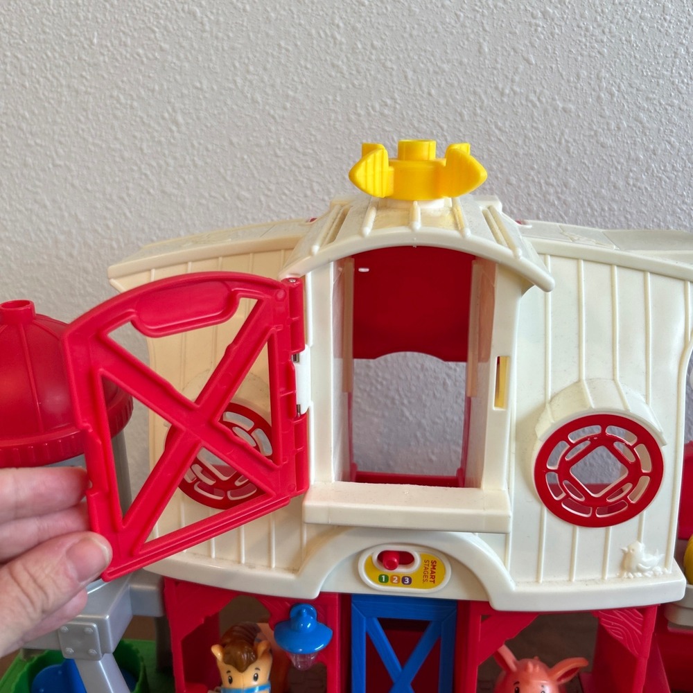 Fisher-Price Little People Caring for Animals Farm Playset with 4 Figures - Picture 7 of 10